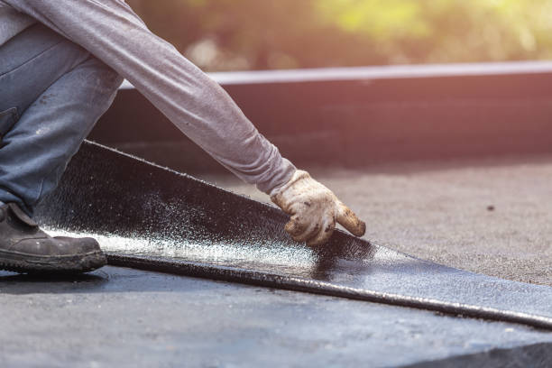 Professional Basement Waterproofing technician working in Frankfort, MI